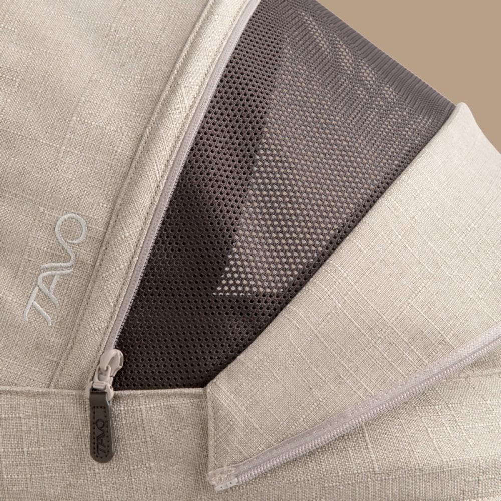 Close up of the ventilated mesh panel of the peek-a-boo window on the Maeve pet car seat in Fawn fashion.