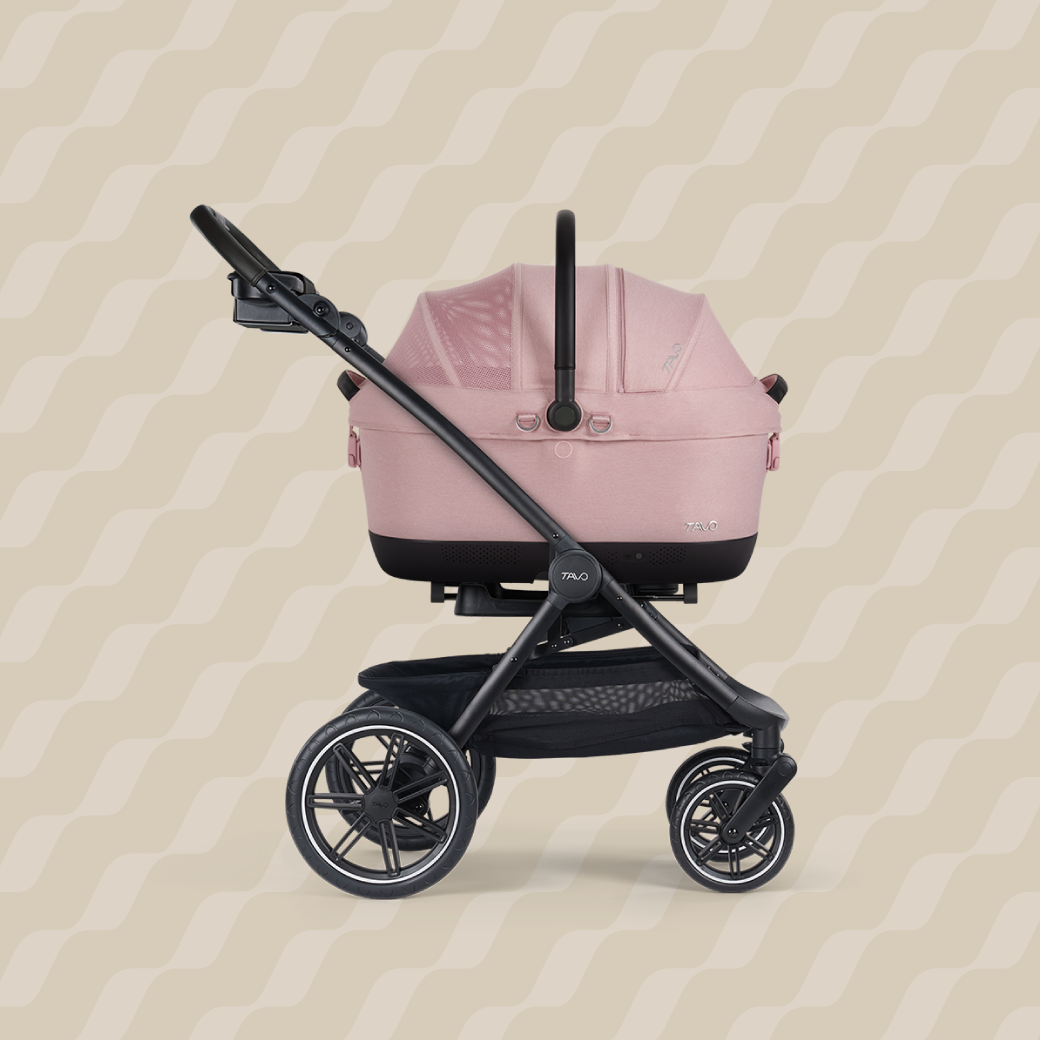 A Maeve iso Wind 6x Pet Car Seat closed, in sakura, and attached to the Roscoe Trek 2.0 Pet Stroller Frame from a side profile

