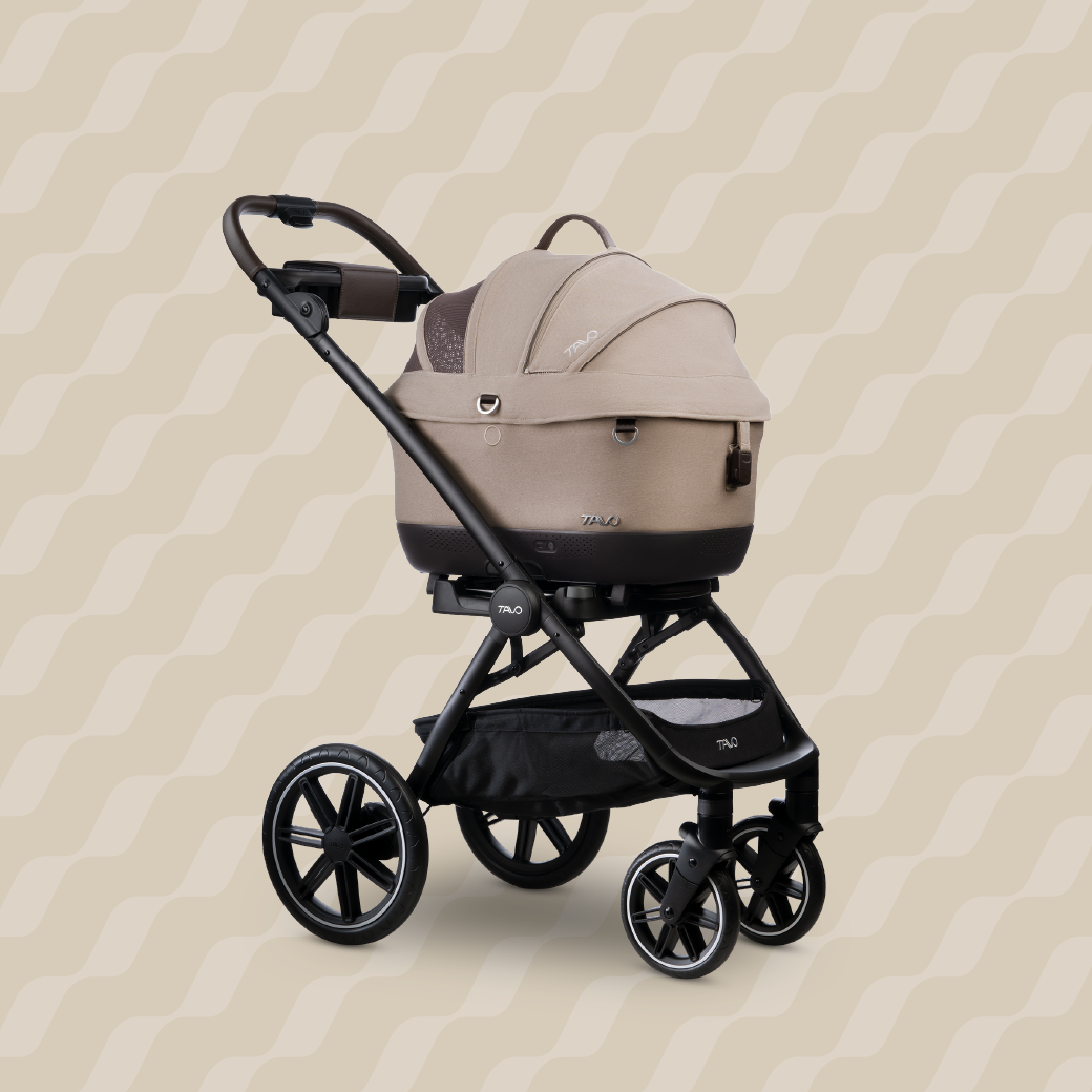 A Maeve iso 5x Wind Travel System in the fashion fawn 