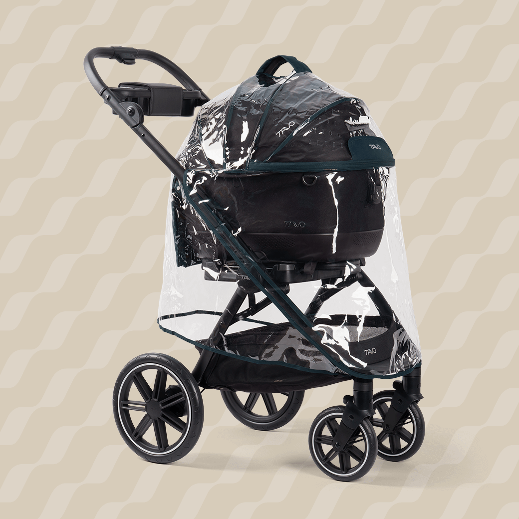 A Tavo Pets rain cover on a Maeve 5 series pet travel system shown from an angle.