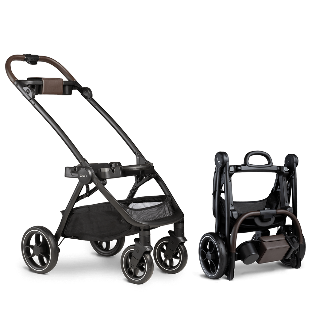 Modern black pet stroller fame standing next to folded stroller frame