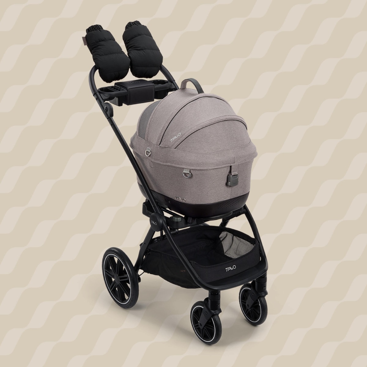 Tavo Pets winter gloves in the fashion onyx shown attached to the handle bar of the Roscoe Trek Stroller Frame